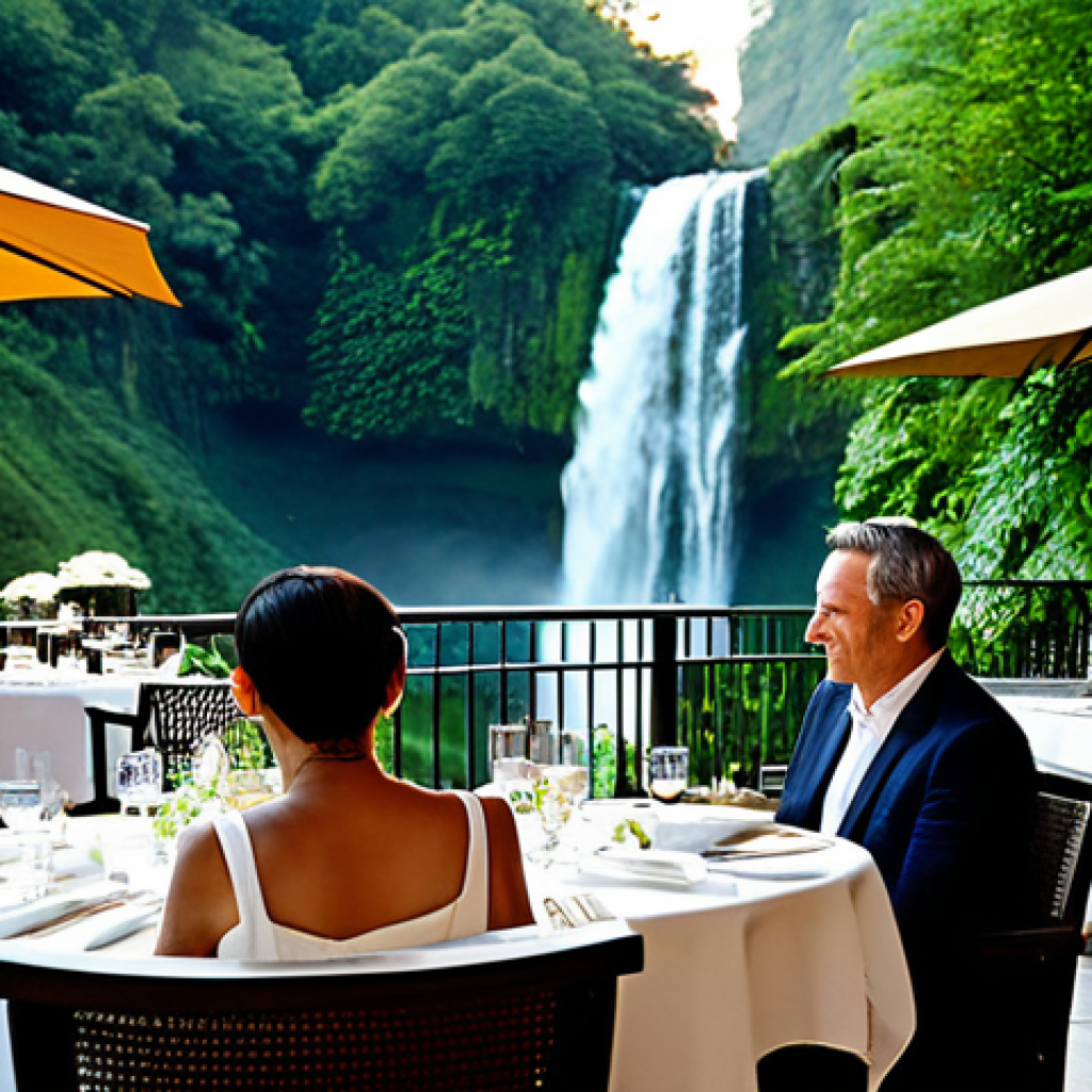**
"Elegant restaurant terrace overlooking a cascading waterfall, soft lighting, tables set with fine dining ware, fully clothed patrons enjoying a meal, appropriate attire, lush greenery, safe for work, perfect anatomy, natural proportions, professional photography, high quality, family-friendly atmosphere."
**